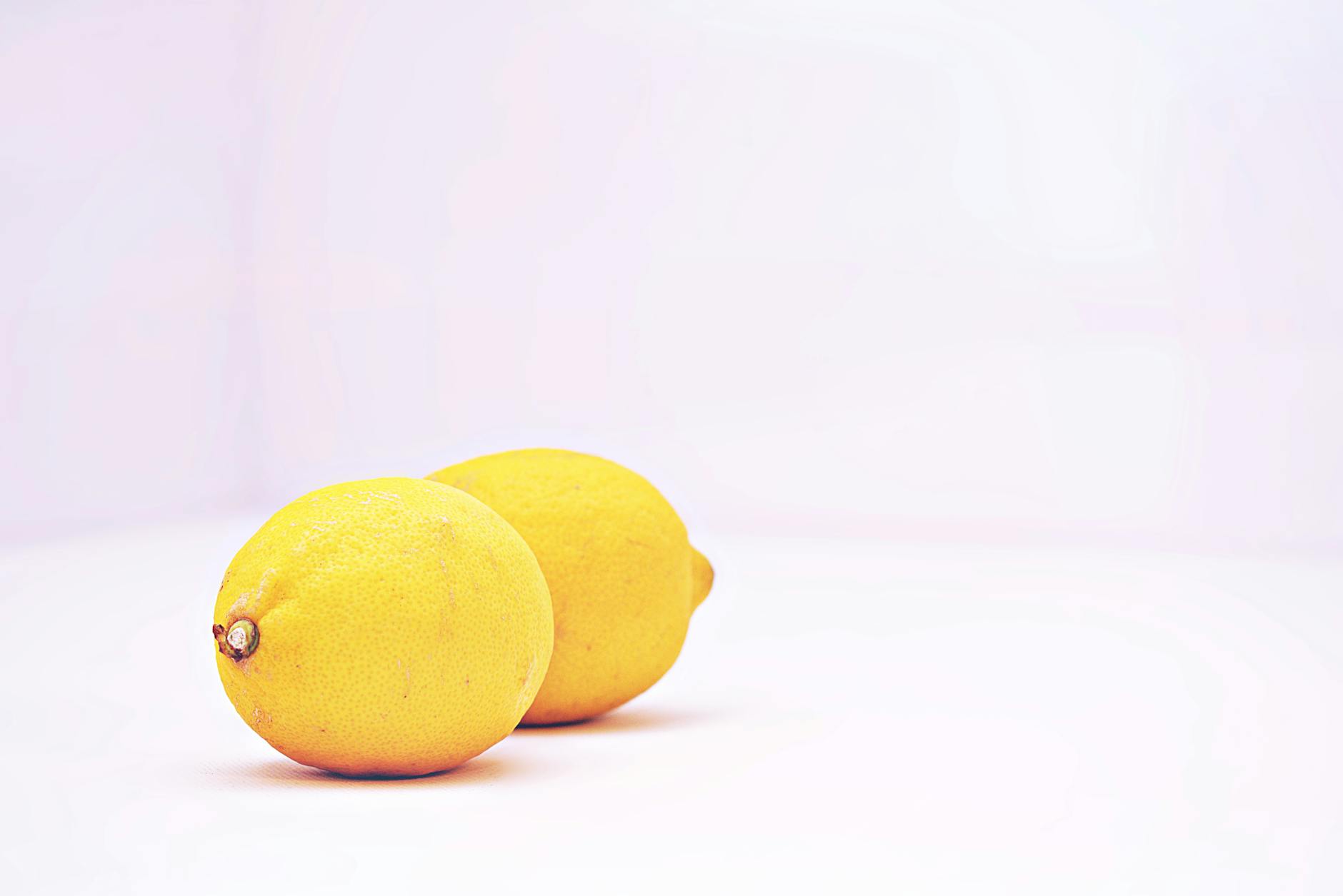 A gentle vibrator resting on soft silk, symbolizing delicate post-recovery pleasure
